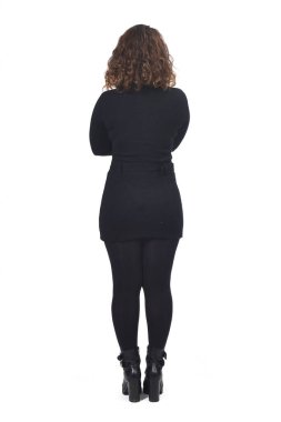 Beyaz kollu bir kadının arkadan görünüşü kesişti.