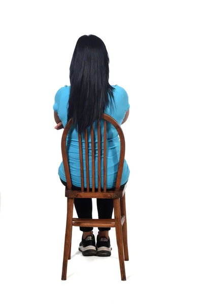 Vista Posteriore Una Donna Seduta Sulla Schiena Con Sfondo Bianco — Foto Stock