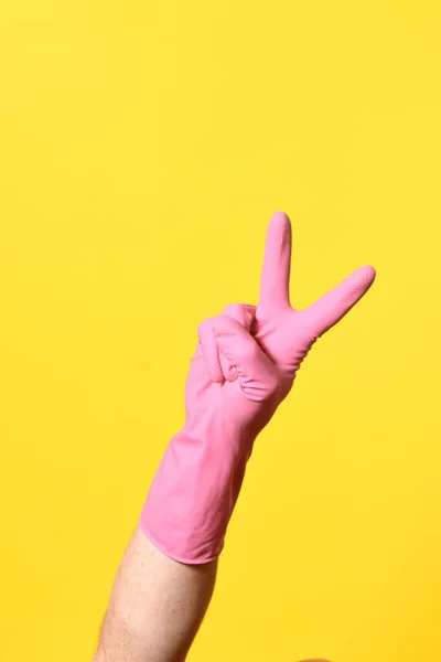 Hand Glove Sign Yellow Background — Stock Photo, Image