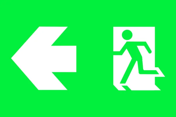 绿色背景下的紧急出口标志 — 图库照片