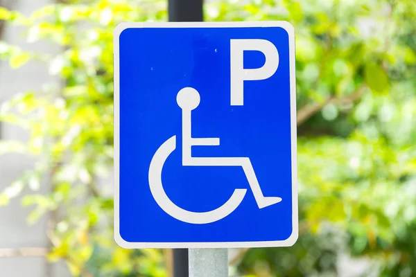 Closeup of handicapped parking place sign