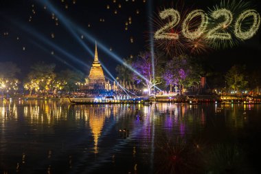 Beautiful New Year Firework 2020 Reflection Over Old Pagoda Loy  clipart