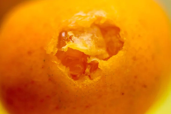 Mordido tangerina madura. Foto. Macro . — Fotografia de Stock