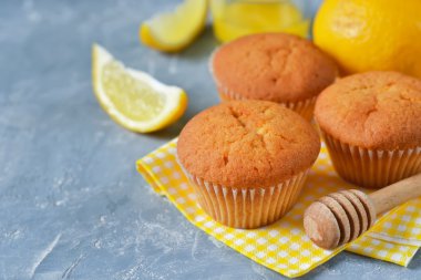 Homemade, lemon muffins with honey and mint  clipart