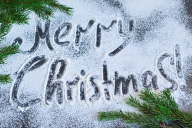 Merry Christmas - Noel yemeği arka plan ile bir yazıt.