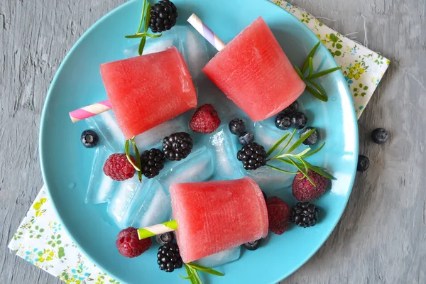 Summer cold desert- frozen watermelon juice, ice cream of berries
