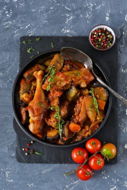 Chicken stewed with vegetables and tomato  clipart