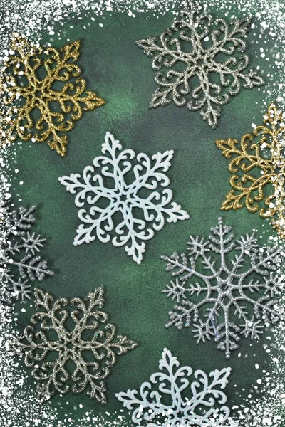 New Year's background. Snowflakes on a green background. — Stock Photo, Image