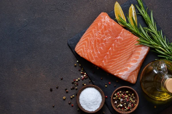 Raw fish salmon filet prepared for cooking. View from above.