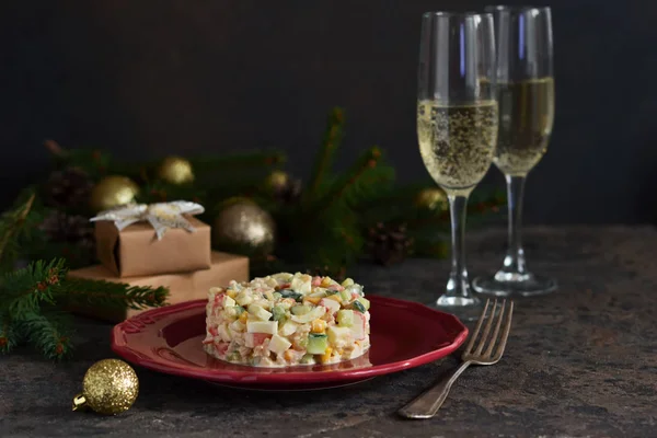 New Year\'s holiday salad with crab and corn on the table. Horizo