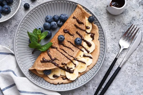 Crepe Banana Chocolate Sauce Blueberry Breakfast Stone Background — Stok Foto