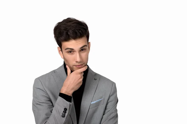 Portrait of the young  man in a jacket cunning  looking in the c — Stock Photo, Image