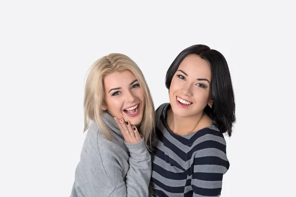 Two  girlfriend blonde and brunette laugh — Stock Photo, Image