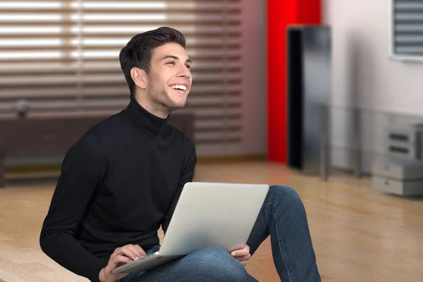 De jonge man met de laptop en koffie smilles — Stockfoto