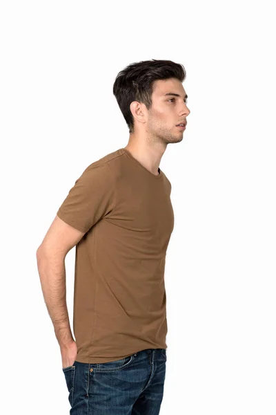 De jonge man in een t-shirt en jeans — Stockfoto