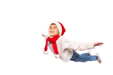 Stüdyo resmi, Noel Baba 'nın kırmızı şapkalı komik çocuğu Hawaii' de uçuyor