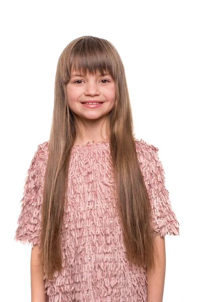Shot of a blonde young girl with long hair and bangs wearing pin — Stock Photo, Image