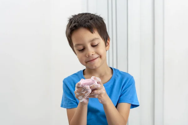 Shot Smiling Little Boy Wearing Blue Shirt Washing Hands Pink — Stock Photo, Image