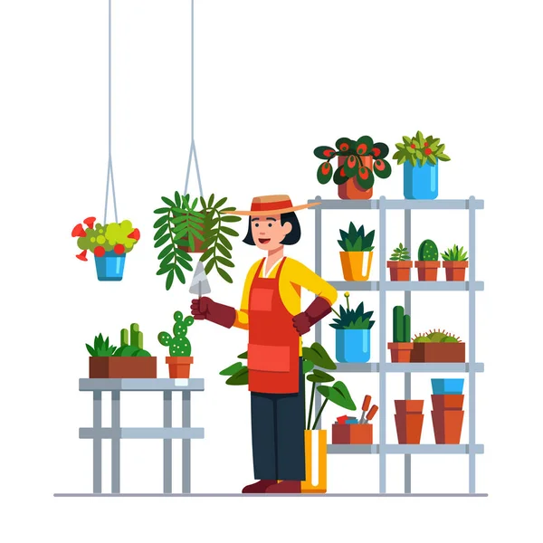 Mujer jardinero trabajando en el jardín botánico — Vector de stock