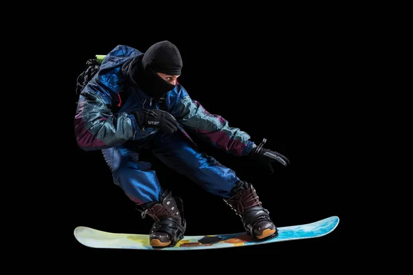 Snowboarder geïsoleerd op zwart — Stockfoto
