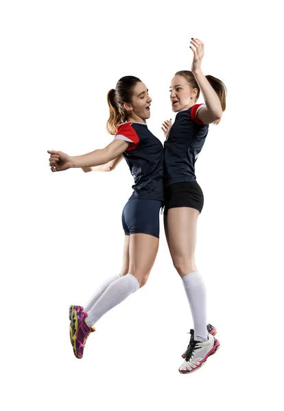 Happy female volleyball players isolated on white — Stock Photo, Image