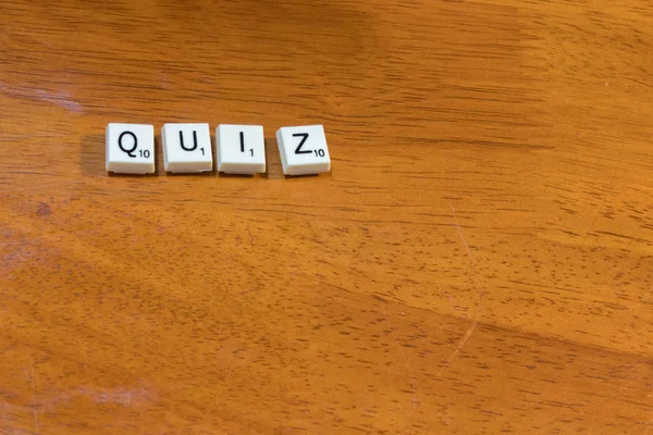 quiz spelled with game pieces