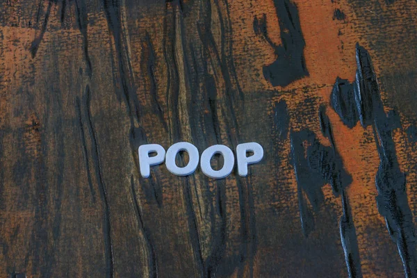 Beyaz yazı yazılı poop — Stok fotoğraf