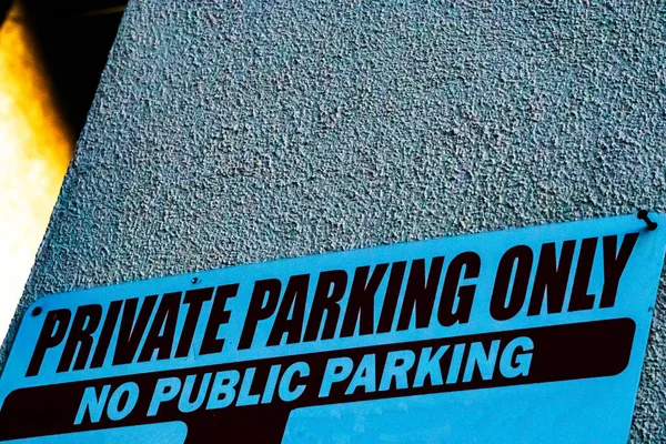 Private parking only sign in blue and black. no public parking — Stock Photo, Image