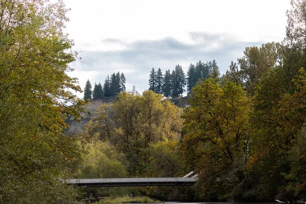White bridge over river in early fall — Stock Photo, Image