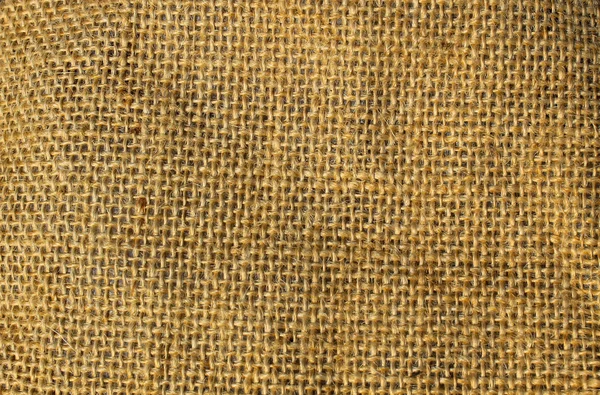 Текстурированный фон мешковины — стоковое фото