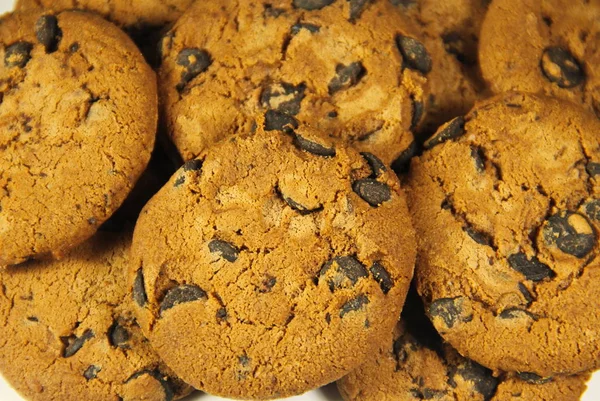 Čokoládové lupínky cookies pozadí — Stock fotografie