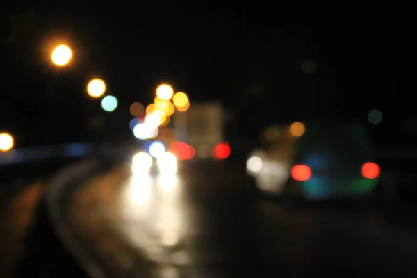 Bokeh wazig auto verlichting 's nachts — Stockfoto