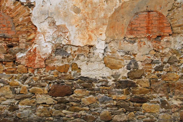 Achtergrond van verweerde oude stenen muur — Stockfoto