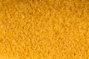 Arka plan bir ham uzun taneli pirinç