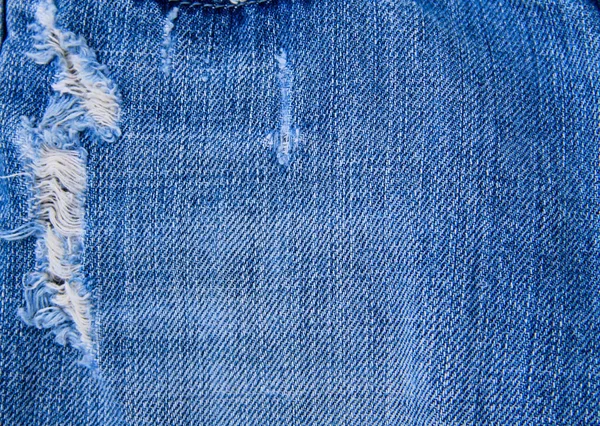 Texture de jeans. Partie d'un jean bleu — Photo