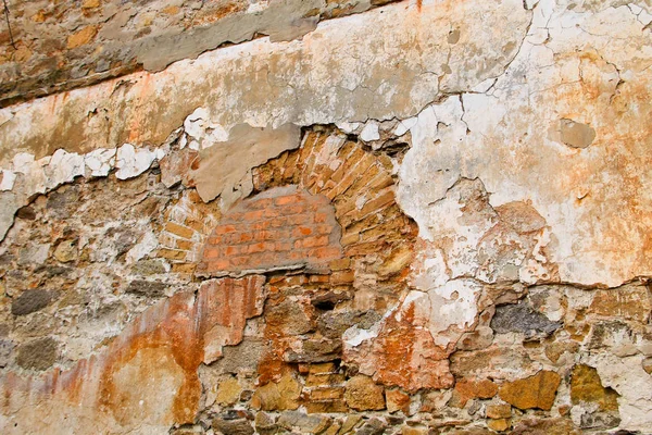 Achtergrond van verweerde oude stenen muur — Stockfoto