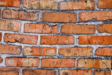 kırmızı tuğla duvarın arka