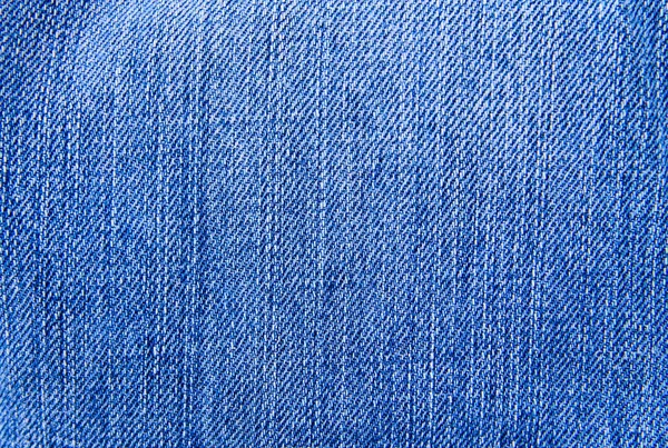 Текстура джинсов. Часть синих джинсов — стоковое фото