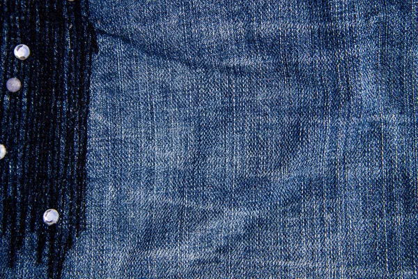 Latar belakang tekstur Jeans. Bagian dari jeans biru — Stok Foto