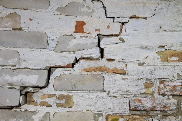 Achtergrond van oude gebarsten bakstenen muur — Stockfoto