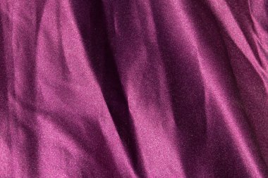 Mor saten arka plan. İpek doku. Kumaş deseni