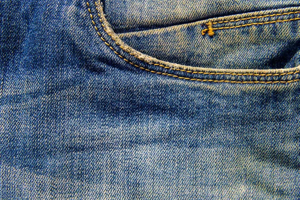 牛仔裤的纹理背景。蓝色牛仔裤的一部分 — 图库照片
