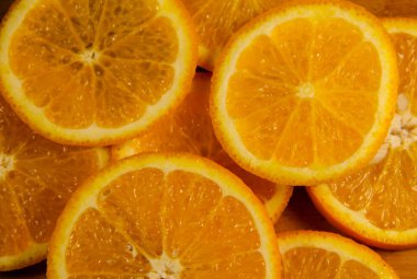 Dilimlenmiş sulu portakal meyvelerinin arka planı