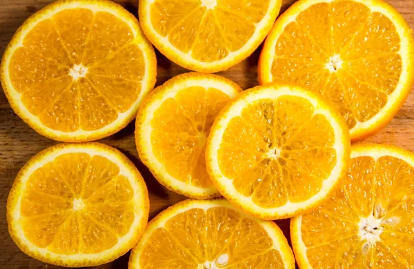 Dilimlenmiş sulu portakal meyvelerinin arka planı — Stok fotoğraf