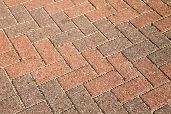 Sidewalk texturierten Hintergrund. Detail eines Pflasters — Stockfoto