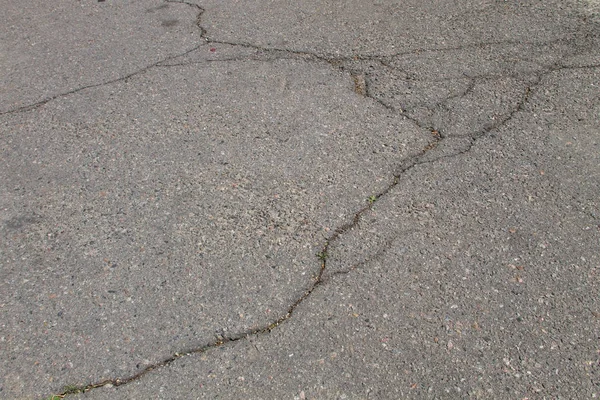 Tekstura z pęknięciami na tle asfaltu — Zdjęcie stockowe