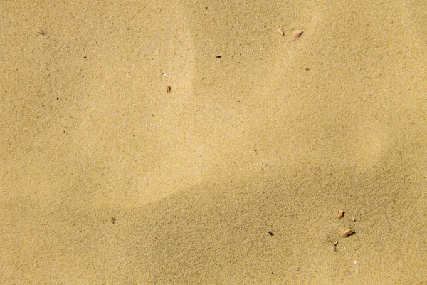 Textura de areia. Praia de areia para fundo — Fotografia de Stock