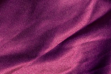 Mor saten arka plan. İpek doku. Kumaş deseni