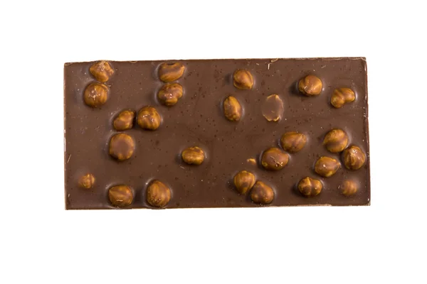 Milk chocolate bar with hazelnuts isolated on white background — Stock Photo, Image