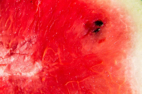 Красный спелый арбуз фруктовая текстура для фона — стоковое фото